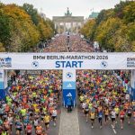 Tens of thousands of runners crossing the start line on the Straße des 17. Juni at the BMW Berlin-Marathon 2026 on September 27 in Berlin, Germany