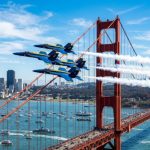Blue Angels jets flying near the Golden Gate Bridge during Fleet Week