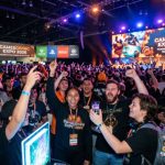 Excited crowd of gamers at GamesGiving Expo 2026 on Thanksgiving weekend